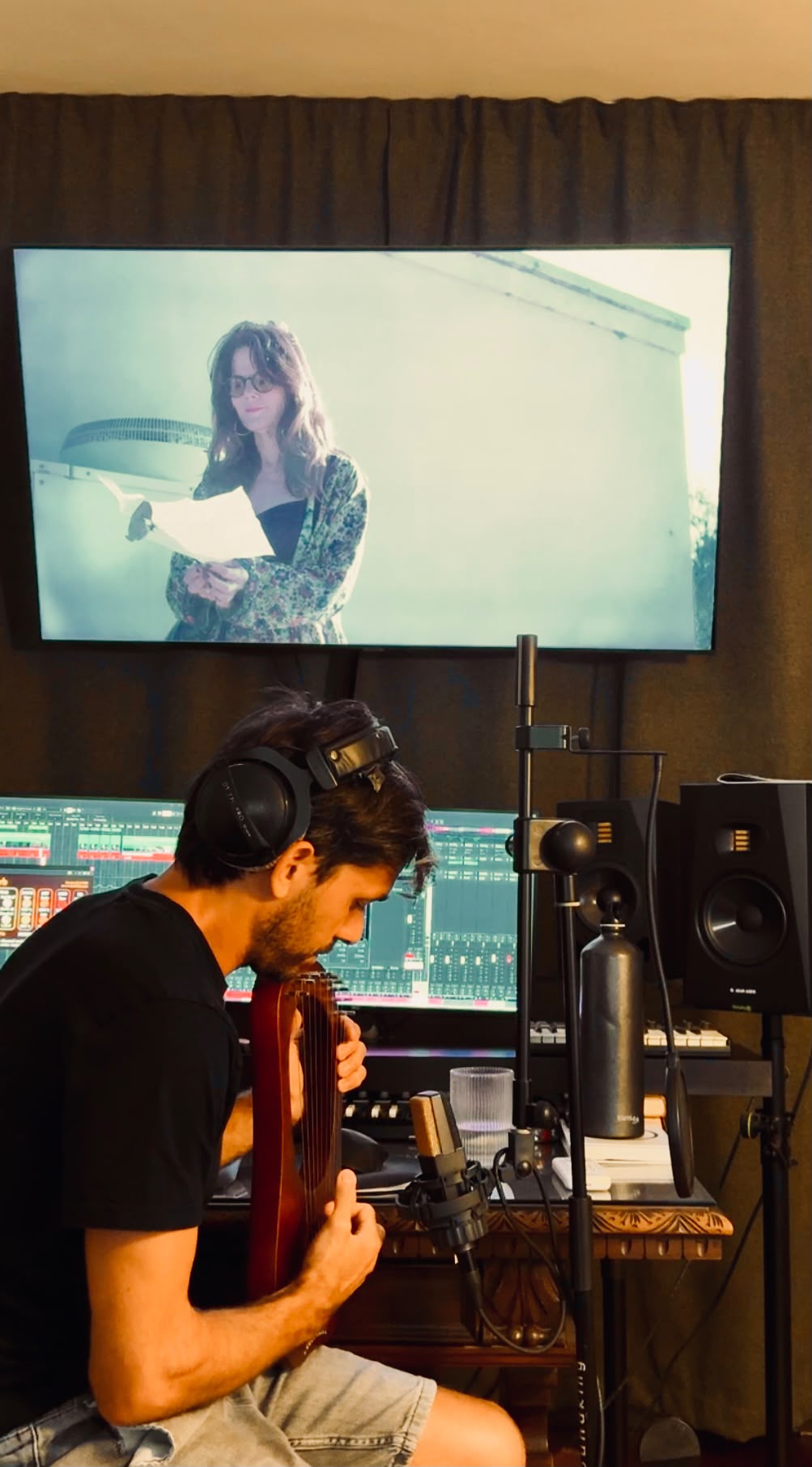 Gal Lev recording a lyre in his studio