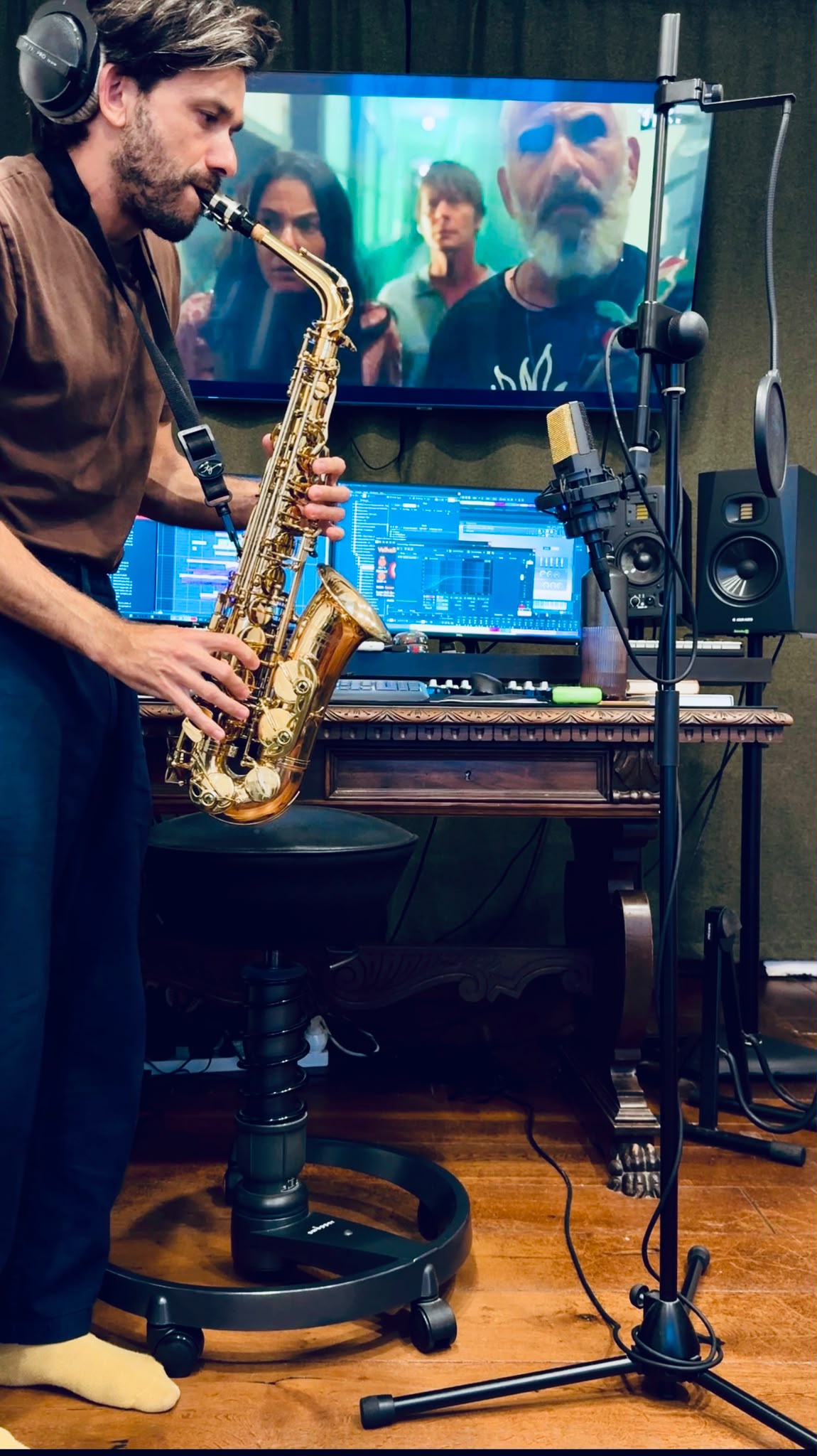 Gal Lev recording saxophone in his studio